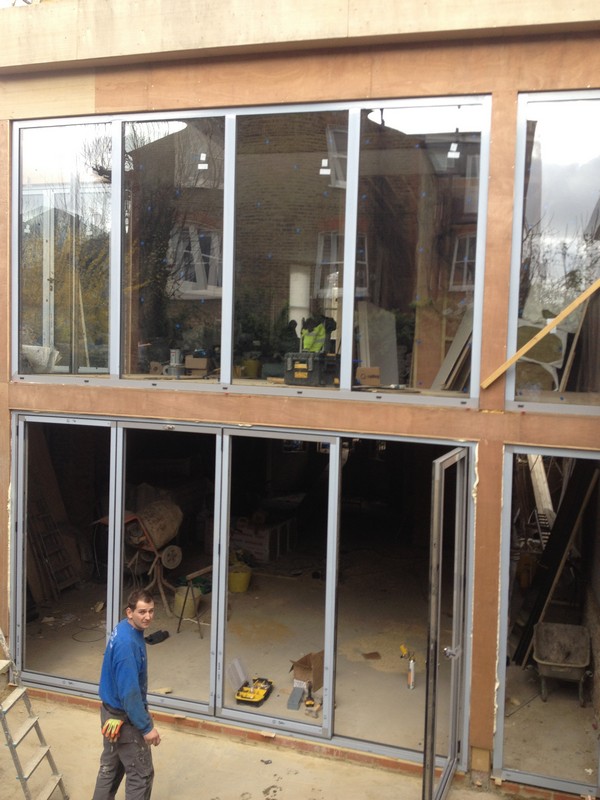 Aluminium bi-fold doors with two-storey glazing in Camden Town