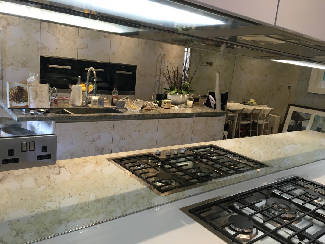 Mirror glass splashback in Camden Town luxury kitchen
